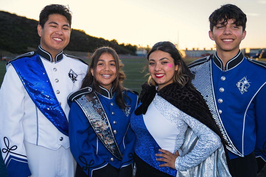 Photo shared by Diamond Ranch Music Department on October 20, 2023 tagging @drcolorguard, and @diamondranchhighschool. May be an image of 4 people and clarinet.
